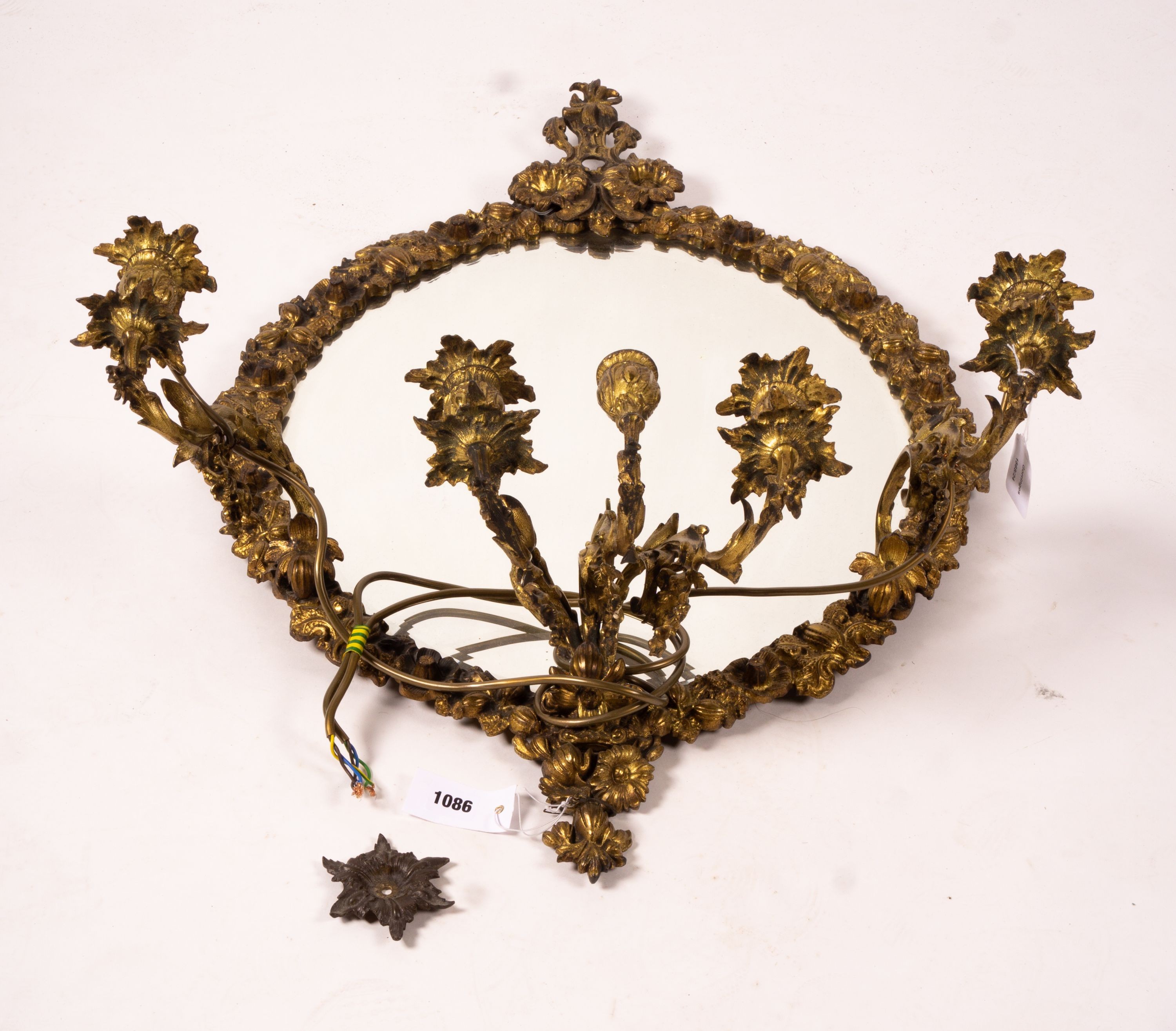 A late 19th century brass five branch girondole, width 64cm, height 84cm